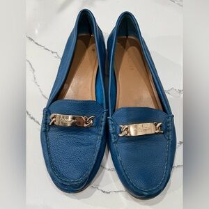 - Blue Coach flats size 9.5.
